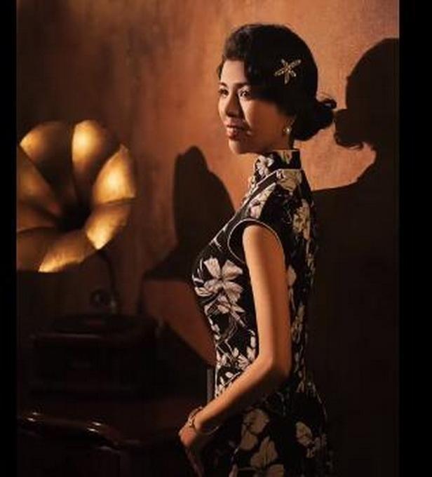 环卫阿姨被邀拍旗袍写真称很感动 网友：阿姨好美